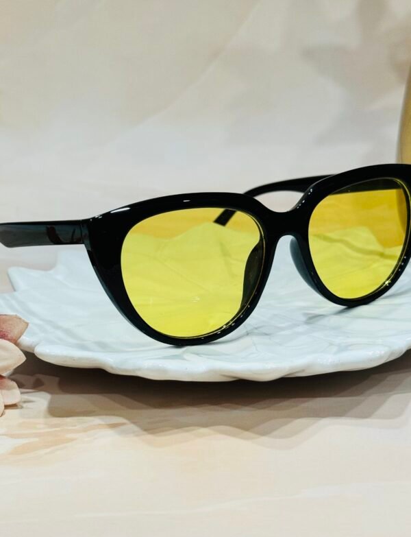 Black, yellow lens, funky cateye sunglasses