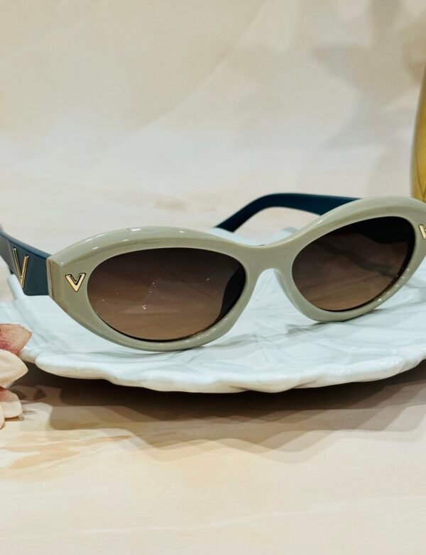 Beige and green, oval, funky cateye sunglass