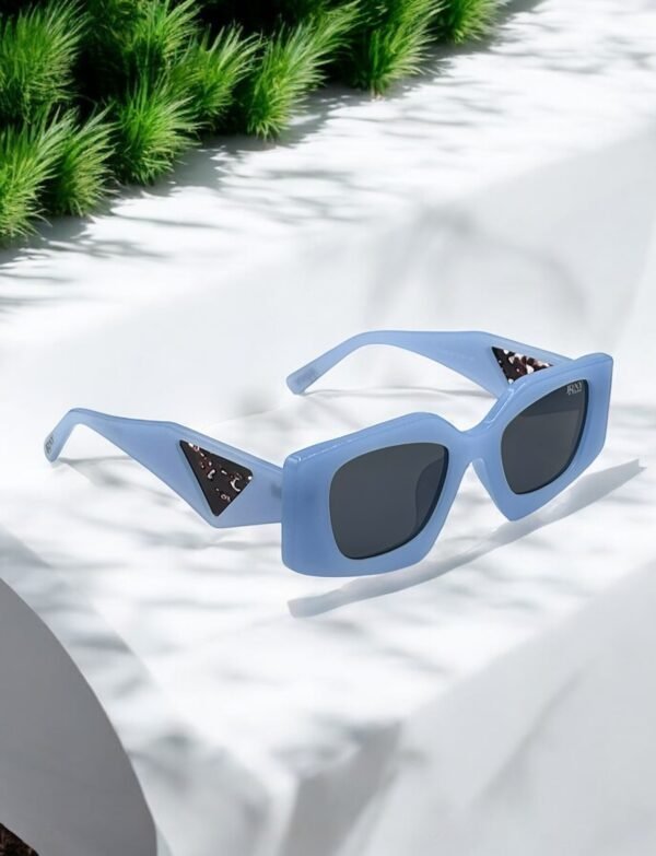 Blue, black lens, big and funky sunglasses